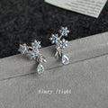 Silver Tone Aqua Snowflake Branch And Clear Teardrop Stud Earrings view 4