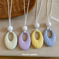 Pastel Oval Textured Pendant Necklace in Four Soft Colors view 2