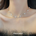 Silver Tone Irregular Pearl Station Necklace with Wavy Chain view 3