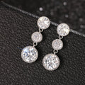 White Metal Triple Round Bezel Clear Drop Earrings Pair view 2