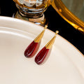 Deep Red Long Teardrop and Gold Tone Dangle Earrings view 3
