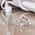 Silver Angel Wing Textured Huggie Hoop Earrings Pair view 1