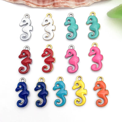 Colorful seahorse charms arranged on a light background