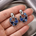 Blue Faceted Stone Open Oval Silver Tone Dangle Earrings view 3