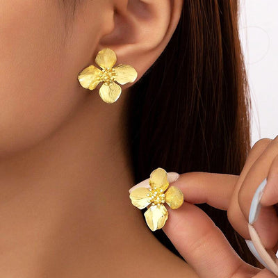 Product view showing textured four-petal flowers with raised clustered centers