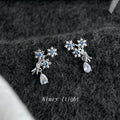 Silver Tone Aqua Snowflake Branch And Clear Teardrop Stud Earrings view 1