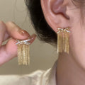 Crystal Bow and Gold Chain Fringe Stud Earrings With Metal Details view 6
