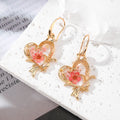 Gold Tone Heart Butterfly Pressed Flower Resin Hook Earrings view 3