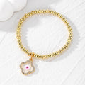 Gold Tone Beaded Crystal Evil Eye Flower Star and Cross Bracelets view 6