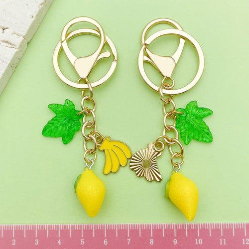 Image 2 showing strawberry, cherry and lemon keychains shown in the product image.