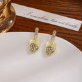 Gold and Silver Clear Look Shovel Small Stud Earrings view 2