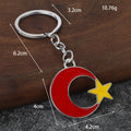 Glossy Crescent Moon and Star Metal Keychain in Red, White, and Yellow view 2