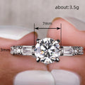 Silver Round Four Prong CZ Ring with Baguette Side Stones view 4
