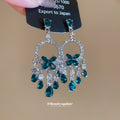 Silver Tone Green Crystal Butterfly Chandelier Earrings view 1