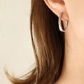 Flat Oval Huggie Hoop Earrings Gold And Steel Tone Metal view 6