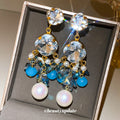 Blue Crystal Floral Drop Earrings in Polished Statement Design view 2