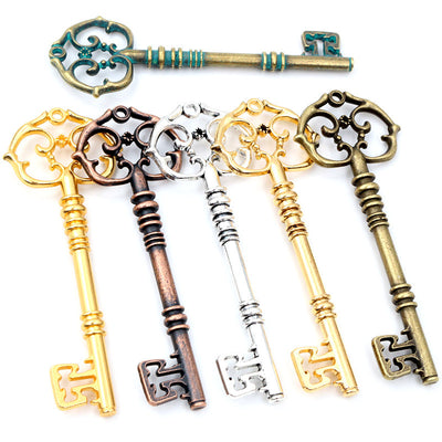 Ornate Skeleton Key Pendants arranged in the pictured color and finish options