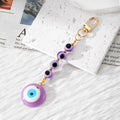 Evil Eye Bead Strand and Round Pendant Clip Keychains in Five Colors view 8