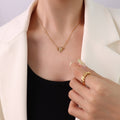 Gold Bee Pendant Necklace With Cat Eye Stone Cable Chain view 1