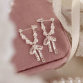Faux Pearl Bow Drop Earrings with Crystal Accents Pair view 3