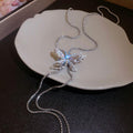Silver Tone Necklace Trio With Sculptural Pendants view 7