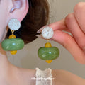 Green Resin Bead Drop Earrings With Yellow Accents view 1