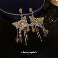 Gold Iridescent Butterfly Crystal Tassel Drop Earrings view 4