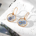 Gold Tone Blue Pressed Flower Resin Hook Earrings in Six Designs view 5