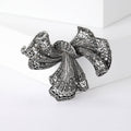 Crystal Ribbon Bow Brooch in Antique Gold and Silver Tones view 3