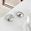 Rounded Teardrop Huggie Earrings In Two Metal Tones view 6