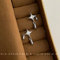Silver Tone Four Point Star Clear Stone And Teardrop Stud Earrings view 1