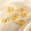 Gold Open Statement Rings Interwoven Pad and Multi Ridge view 2