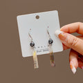 Shell Look Bead and Long Bar Earrings in Two Closures view 1