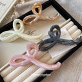 Crossed Loop Acrylic Hair Claw In Pink Marbled Or Gray Black view 2