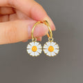 Gold Enamel White Daisy Charm Huggie Hoop Earrings view 4