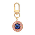 Twelve Piece Gold Tone Heart and Round Evil Eye Clip Keychain Set view 3