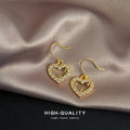 Gold-Tone Crystal Pavé Open Heart Star Hook Earrings Pair view 3