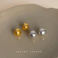 Matte Gold and Silver Pebble Bean Metal Stud Earrings view 1
