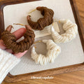 Knitted Yarn Twist Hoop Earrings In Brown And Ivory view 4