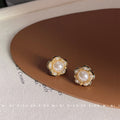 Gold Flower Pearl Stud Earrings Seed Pearl Halo Rim view 1