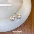 White Pearl Flower Stud Earrings with Gold Tone Trim view 2