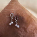 Silver Tone Clear Stone Knot And Double White Pearl Tassel Earrings view 2