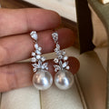 Pearl Drop Earrings with Crystal Leaf Clusters in Two Tones view 1