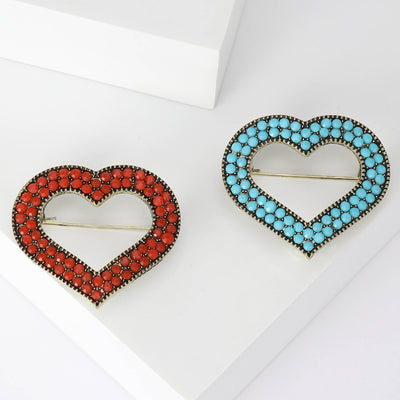 Double Heart Crystal brooch In Red And Turquoise Decorative Lapel Pin shown in front view on a light background