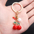 Six-Style Red and Black Cherry Pearl Charm Keychain Collection view 3