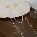 Gold Tone Floral Hair Clip With Pearl And Chain Drapes view 4