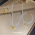 Pearl Necklace Bracelet Earrings Gold Rocking Horse Charms view 3