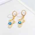 Gold Tone Evil Eye Huggie Earrings with Ten Symbolic Drop Designs view 9