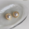 Gold Textured Round Pearl Stud Earrings Circular Rims view 4