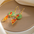 Gold Tone Koi Fish Green Disc Long Dangle Hook Earrings view 3